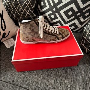 Brand new in box Coach sequin high top sneakers.